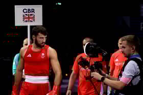 Patrick Brown enters the ring at the Paris Olympics