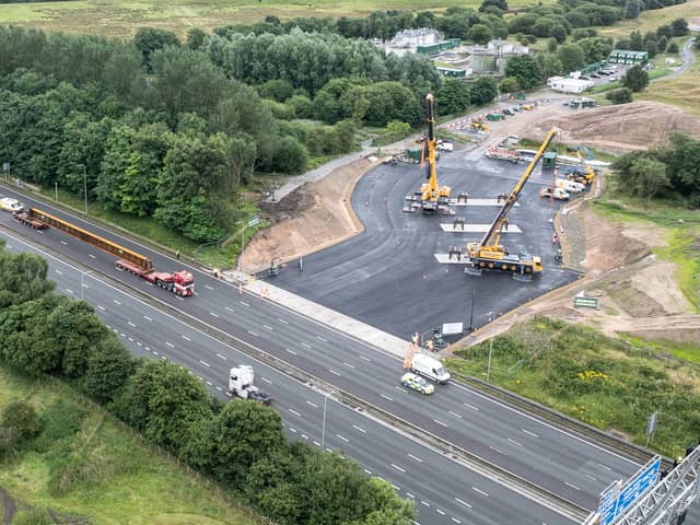 Aerial view of the beams entering the work site on the M62.