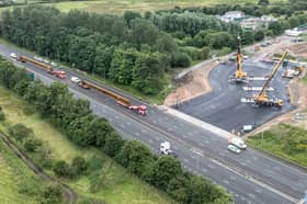 Aerial view of the beams entering the work site on the M62.