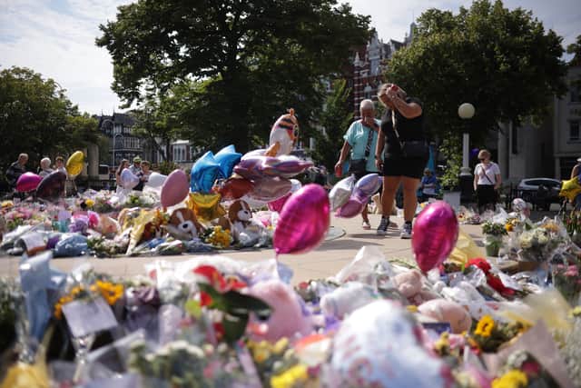 Flowers and tributes outside the Atkinson Art Centre