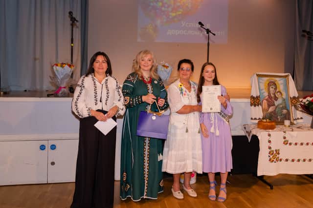 (L to R)PTA chair Natalya Iansinska, headteacher Kateryna Tyshkul, head of examinations Maria Sawdyk and graduate Sofiia Skorytska. Credit: Maryna Seletska