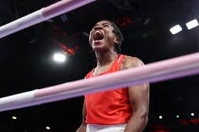 Cindy Ngamba roars with delight after sealing at least a bronze medal at the Paris Olympics. 