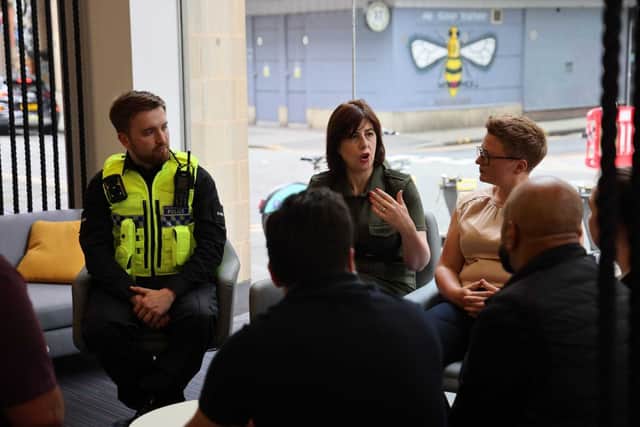 Lucy Powell, Manchester Central MP, and Bev Craig, Manchester council leader, meet with police and shop owners after rioting hit the city centre.