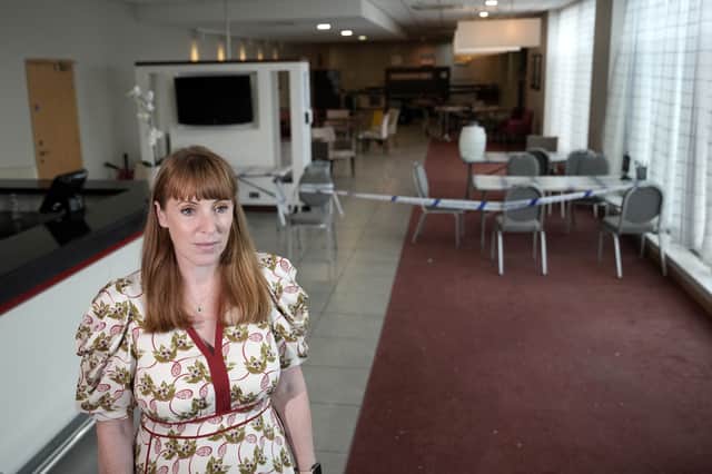 Police tape is clearly visible on Angela Rayner's visit to the Holiday Inn Express in Manvers