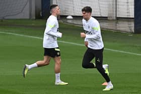 John Stones, Kyle Walker and Phil Foden returned to Manchester City training on Monday.