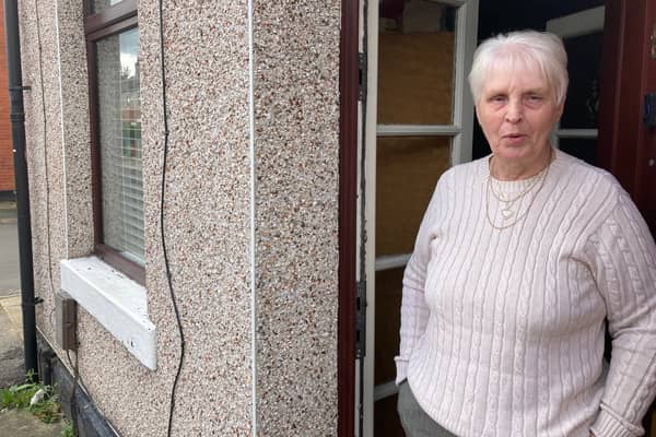 June Eastwood, 76, who lives right next to a huge IX Wireless mast on Clarendon Street, Rochdale. Credit: LDRS.