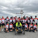 Andy Walker and his team at John O'Groats. 