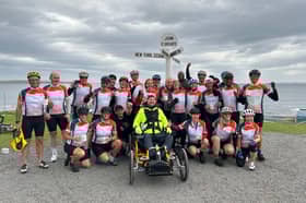 Andy Walker and his team at John O'Groats. 