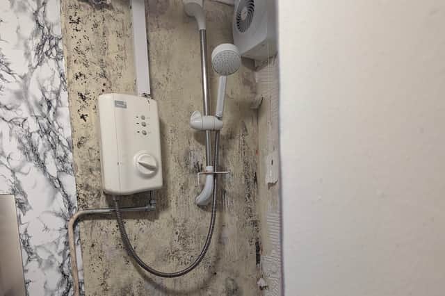 Work on the faulty shower installed the the home of the RBH tenant living on the Freehold Estate in Rochdale.