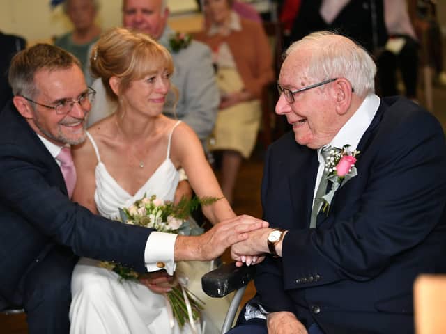 Henry Clayton at the wedding blessing with daughter Fiona Butler-Clayton and her husband.