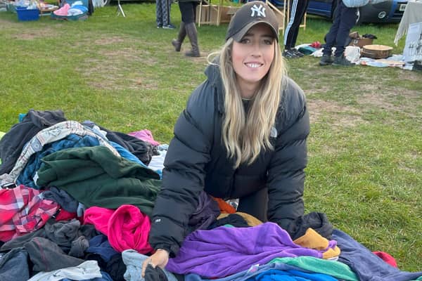 Becky Chorlton with some of her second-hand clothes. 