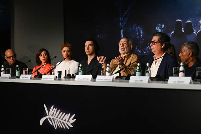 US director Francis Ford Coppola (3rdR) speaks past (fromL) US actor Laurence Fishburne, US actress Aubrey Plaza, British actress Nathalie Emmanuel, US actor Adam Driver, US screenwriter Roman Coppola and US actor Giancarlo Esposito a press conference for the film "Megalopolis" during the 77th edition of the Cannes Film Festival in Cannes, southern France, on May 17, 2024.