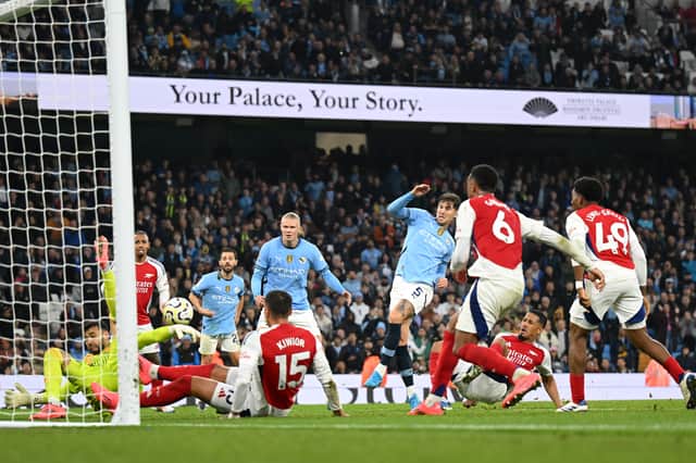 John Stones' injury-time goal sealed a point for Manchester City on Sunday.