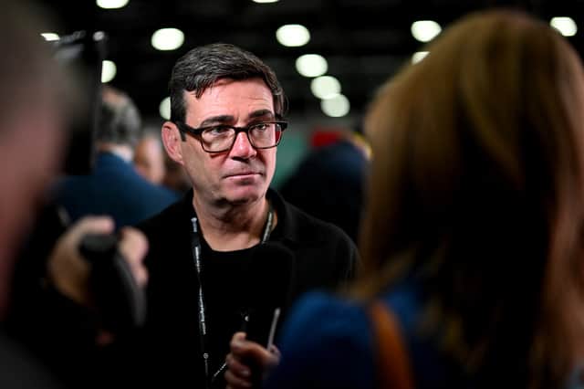 Andy Burnham speaks to a member of the media during an interview on the second day of the Labour Party conference