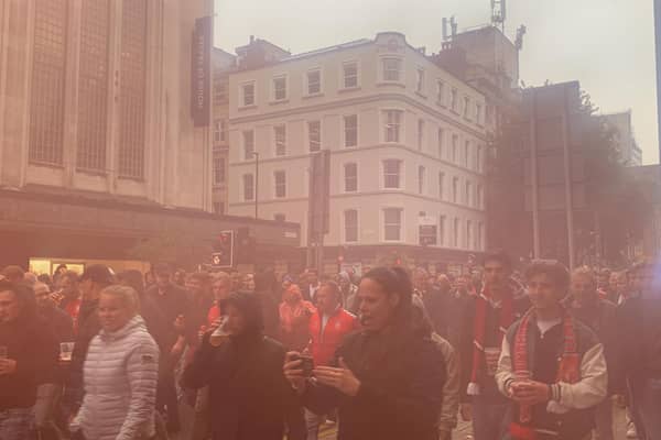 FC Twente fans march down Deansgate on their way to Old Trafford
