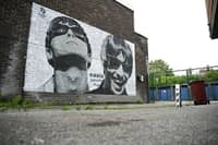 A new Oasis street artwork on the side of the Sifters Records in Burnage. 