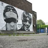 A new Oasis street artwork on the side of the Sifters Records in Burnage. 