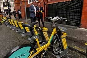 Dame Sarah Storey, the UK's most decorated Paralympian and Greater Manchester's Active Travel Commissioner, shows Mayor Andy Burnham the newest medals in her collection. 