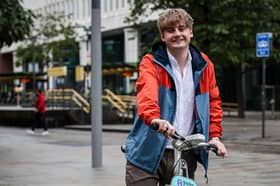 Ethan Davies trying out the Manchester Bee Bikes.