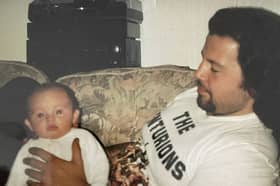 Izak Lewis as a baby with his late dad, Patrick Lewis. 