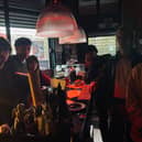 Owners Adam Porrino, front left, and Tess Parkinson, back left, stage a sit-in protest at Café Blah after their landlords allegedly 'changed the locks'.