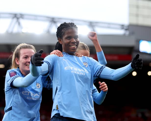 Bunny Shaw celebrates scoring Manchester City's second goal at Liverpool. 