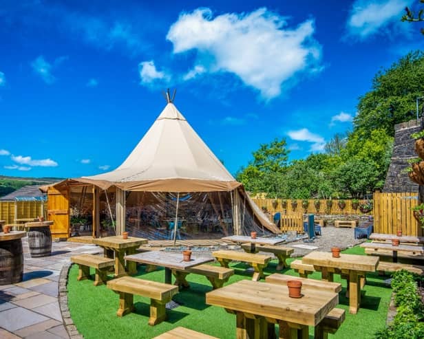 Planners have ordered the removal of the 'teepee' at the Eagle and Child in Ramsbottom