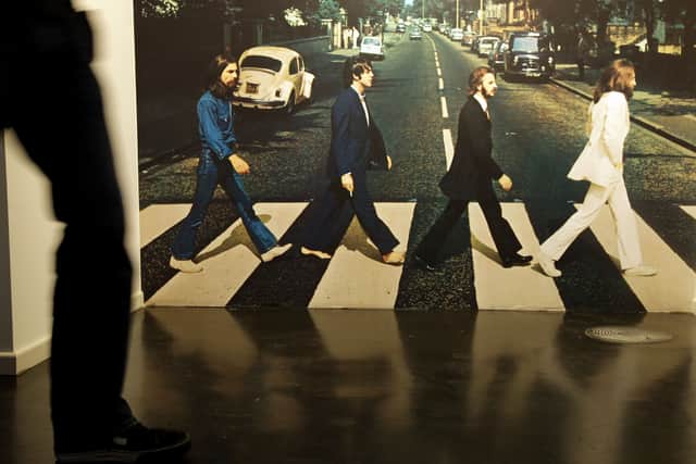Many believe that the album cover for The Beatles Abbey Road contained hints that Sir Paul McCartney had died, including the licence plate of the VW Beetle in the background.
