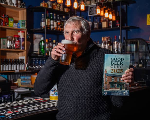 Rob Cocker, from Stoke-on-trent, with his good beer guide in his local pub Manor Court Ale House enjoying a pint of beer to add to his list. So far he has visited over 12,000 pubs in 55 years. Photo: William Lailey / SWNS