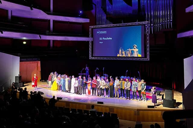 DJ Paulette on stage with all the performers of the WOMEX opening night at Manchester's Bridgewater Hall.