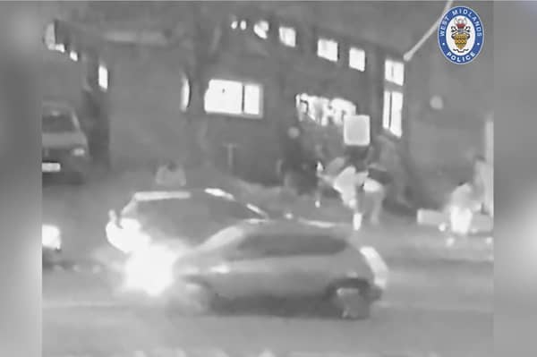 CCTV captures the moment three mourners are shot in a drive-by shooting at a funeral.
