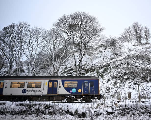 A Northern Rail train in the snow.