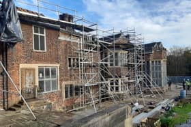 Hopwood Hall surrounded by scaffolding in 2022. Uploaded by George Lythgoe. Credit: Rochdale Council. Free to use for LDRS partners