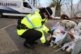 Tributes left by the community at the scene in Manchester where the remains of a baby girl, now namedd Ava by police, were discovered
