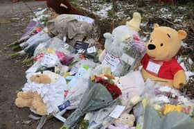 Tributes left by the community at the scene in Manchester where the remains of a baby girl, now namedd Ava by police, were discovered.