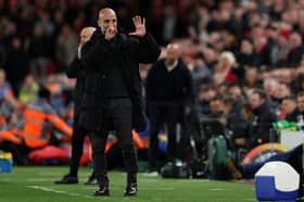 Pep Guardiola held six fingers up to the Liverpool fans after Manchester City's loss at Anfield.