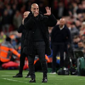 Pep Guardiola held six fingers up to the Liverpool fans after Manchester City's loss at Anfield.