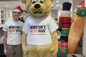 Alfie Watts with Winston's Bear At the Christmas party 