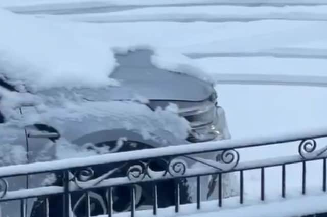 Snow coats roads in Anfield ahead of Liverpool vs Manchester United match.