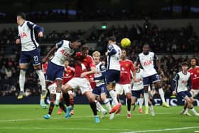 Jonny Evans of Manchester United scores his team's third goal during the Carabao Cup Quarter Final match between Tottenham Hotspur and Manchester United at Tottenham Hotspur Stadium on December 19, 2024 in London, England.