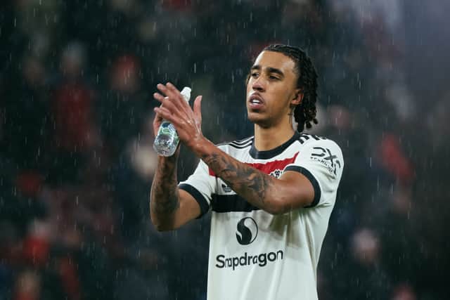 Leny Yoro of Manchester United applauds fans following the Premier League match between Liverpool FC and Manchester United FC at Anfield on January 05, 2025 in Liverpool, England.