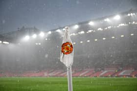 A general view of a corner flag during a hail storm during the Premier League match between Manchester United and Arsenal FC at Old Trafford on May 12, 2024 in Manchester, England.
