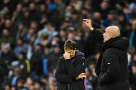 West Ham United's Spanish manager Julen Lopetegui (L) and Manchester City's Spanish manager Pep Guardiola (R) react during the English Premier League football match between Manchester City and West Ham United at the Etihad Stadium in Manchester, north west England, on January 4, 2025.