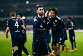 Bruno Fernandes of Manchester United applauds fans following the Emirates FA Cup Third Round match between Arsenal and Manchester United at Emirates Stadium on January 12, 2025 in London, England. 