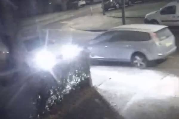 A Mercedes-Benz crashed into a parked car and a tree, before fleeing the scene in Dagenham, East London.