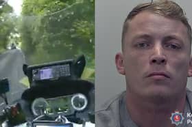 Dangerous driver reverses into police motorbike.