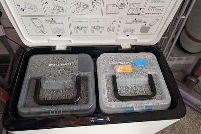 The Lulu base station empties and refills the robot, as well as washing and drying the mop