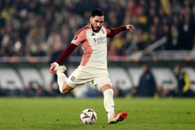 Rayan Cherki of Olympique Lyonnais takes a shot during the UEFA Europa League 2024/25 League Phase MD7 match between Fenerbahce SK and Olympique Lyonnais at  on January 23, 2025 in Istanbul, Turkey. 