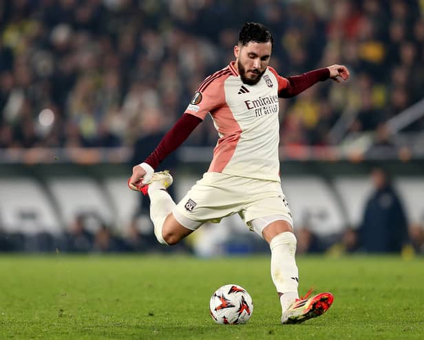 Rayan Cherki of Olympique Lyonnais takes a shot during the UEFA Europa League 2024/25 League Phase MD7 match between Fenerbahce SK and Olympique Lyonnais at  on January 23, 2025 in Istanbul, Turkey. 