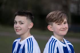 Flo Topham (L) and Camille Porhel, who play for York Railway Institute (YRI) AFC u12s Girls, have launched a campaign defending their right to have short hair, after they were accused of being boys during a game. 